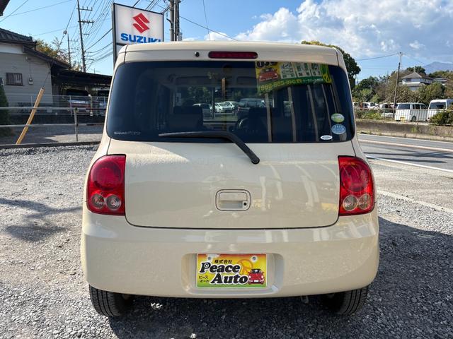 アルトラパン Ｇ　平成２１年式　車検令和８年７月　走行距離１０５００キロ　タイミングチェーン　スマートキー　純正アルミ　ＥＴＣ　電動格納ミラー　ベンチシート　純正オーディオ　エアコン　パワステ　Ｗエアバッグ　修復歴無し（11枚目）