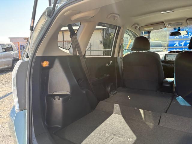 フィットハイブリッド RS 平成24年式 車検令和9年6月 走行距離75000キロ デカナビ バックカメラ 地デジ 純正アルミ フォグランプ スマートキー HIDヘッドライト アイドリングストップ ETC 修復歴無し(20枚目)