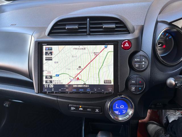 フィットハイブリッド RS 平成24年式 車検令和9年6月 走行距離75000キロ デカナビ バックカメラ 地デジ 純正アルミ フォグランプ スマートキー HIDヘッドライト アイドリングストップ ETC 修復歴無し(35枚目)