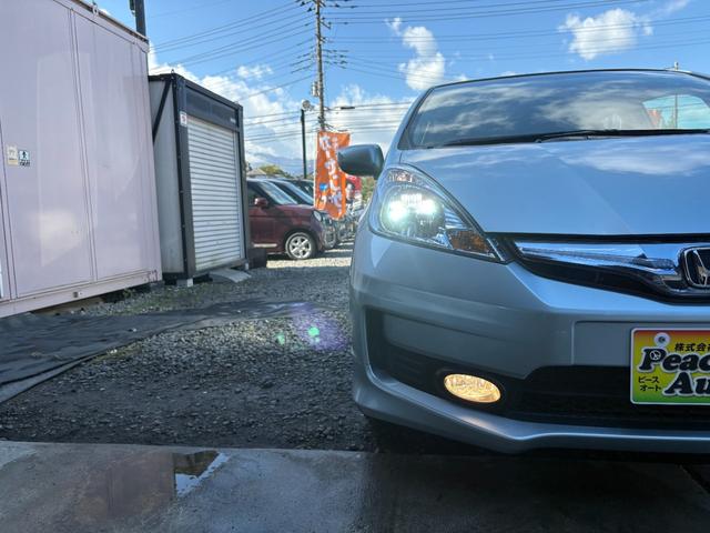 フィットハイブリッド RS 平成24年式 車検令和9年6月 走行距離75000キロ デカナビ バックカメラ 地デジ 純正アルミ フォグランプ スマートキー HIDヘッドライト アイドリングストップ ETC 修復歴無し(50枚目)