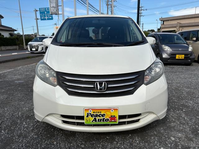 フリード G ジャストセレクション 平成22年式 走行距離69000キロ ナビ ワンセグTV スマートキー ETC 両側電動スライドドア 純正アルミ 3列シート7人乗り HIDヘッドライト 修復歴無し(6枚目)