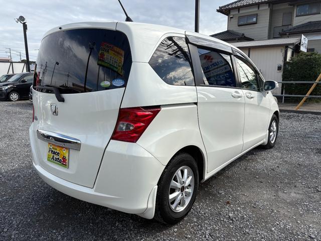 フリード G ジャストセレクション 平成22年式 走行距離69000キロ ナビ ワンセグTV スマートキー ETC 両側電動スライドドア 純正アルミ 3列シート7人乗り HIDヘッドライト 修復歴無し(10枚目)