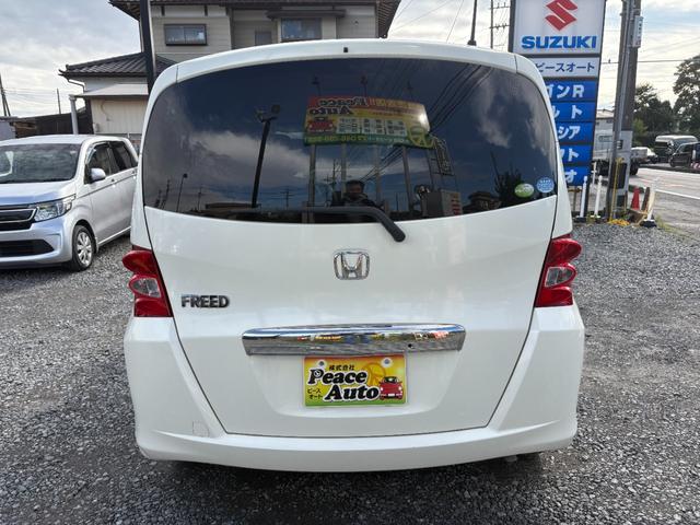 フリード G ジャストセレクション 平成22年式 走行距離69000キロ ナビ ワンセグTV スマートキー ETC 両側電動スライドドア 純正アルミ 3列シート7人乗り HIDヘッドライト 修復歴無し(11枚目)