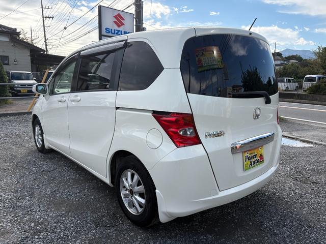 フリード G ジャストセレクション 平成22年式 走行距離69000キロ ナビ ワンセグTV スマートキー ETC 両側電動スライドドア 純正アルミ 3列シート7人乗り HIDヘッドライト 修復歴無し(12枚目)