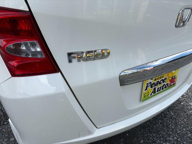 フリード G ジャストセレクション 平成22年式 走行距離69000キロ ナビ ワンセグTV スマートキー ETC 両側電動スライドドア 純正アルミ 3列シート7人乗り HIDヘッドライト 修復歴無し(13枚目)