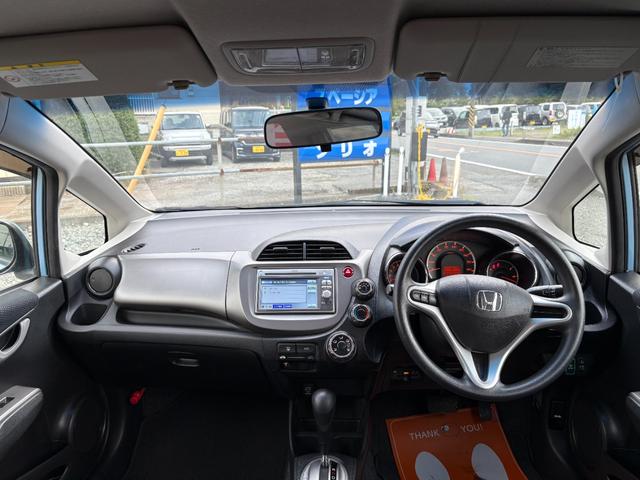 フィット 13G・スマートセレクション 平成24年式 走行距離37000キロ ナビ バックカメラ ワンセグTV スマートキー ETC 電動格納ミラー ステアリングスイッチ Wエアバッグ ライトレベライザー 修復歴無し(30枚目)