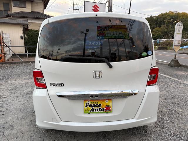 フリード Ｇ　ジャストセレクション　平成２７年式　走行距離５７０００キロ　ナビ　バックカメラ　ワンセグＴＶ　両側電動スライドドア　Ｂｌｕｅｔｏｏｔｈオーディオ　ＥＴＣ　スマートキー　社外アルミ　３列シート６人乗り（11枚目）