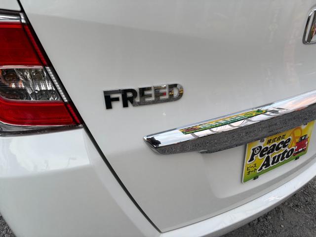 フリード Ｇ　ジャストセレクション　平成２７年式　走行距離５７０００キロ　ナビ　バックカメラ　ワンセグＴＶ　両側電動スライドドア　Ｂｌｕｅｔｏｏｔｈオーディオ　ＥＴＣ　スマートキー　社外アルミ　３列シート６人乗り（13枚目）