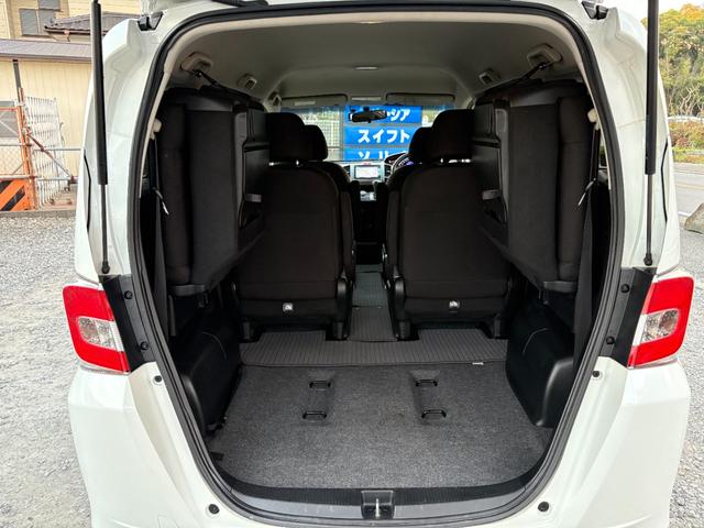 フリード Ｇ　ジャストセレクション　平成２７年式　走行距離５７０００キロ　ナビ　バックカメラ　ワンセグＴＶ　両側電動スライドドア　Ｂｌｕｅｔｏｏｔｈオーディオ　ＥＴＣ　スマートキー　社外アルミ　３列シート６人乗り（19枚目）