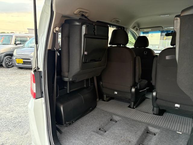 フリード Ｇ　ジャストセレクション　平成２７年式　走行距離５７０００キロ　ナビ　バックカメラ　ワンセグＴＶ　両側電動スライドドア　Ｂｌｕｅｔｏｏｔｈオーディオ　ＥＴＣ　スマートキー　社外アルミ　３列シート６人乗り（20枚目）