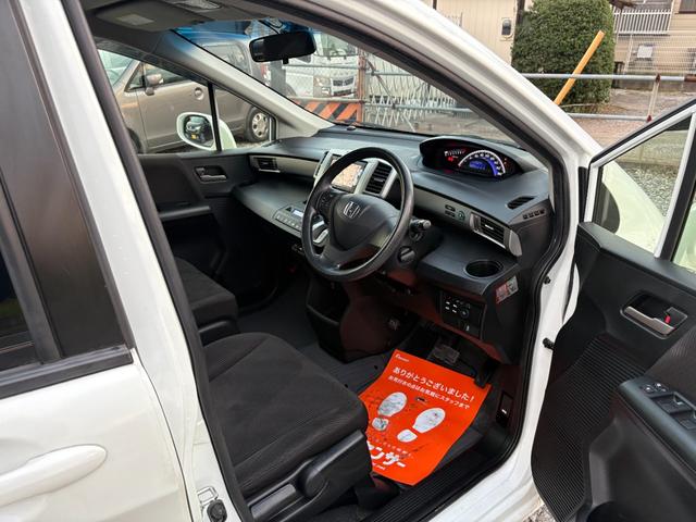 フリード Ｇ　ジャストセレクション　平成２７年式　走行距離５７０００キロ　ナビ　バックカメラ　ワンセグＴＶ　両側電動スライドドア　Ｂｌｕｅｔｏｏｔｈオーディオ　ＥＴＣ　スマートキー　社外アルミ　３列シート６人乗り（27枚目）