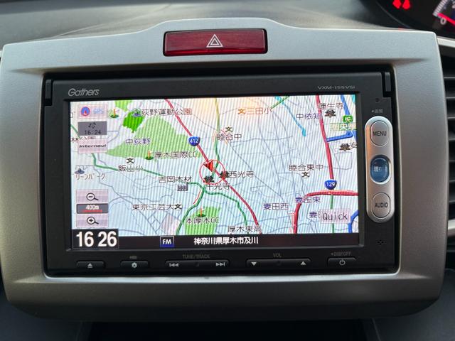 フリード Ｇ　ジャストセレクション　平成２７年式　走行距離５７０００キロ　ナビ　バックカメラ　ワンセグＴＶ　両側電動スライドドア　Ｂｌｕｅｔｏｏｔｈオーディオ　ＥＴＣ　スマートキー　社外アルミ　３列シート６人乗り（34枚目）