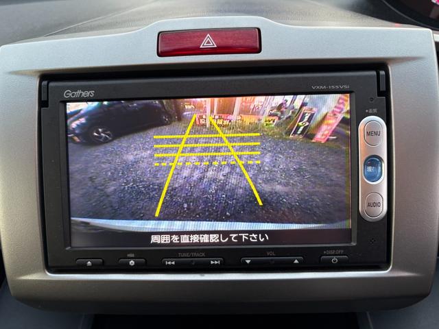 フリード Ｇ　ジャストセレクション　平成２７年式　走行距離５７０００キロ　ナビ　バックカメラ　ワンセグＴＶ　両側電動スライドドア　Ｂｌｕｅｔｏｏｔｈオーディオ　ＥＴＣ　スマートキー　社外アルミ　３列シート６人乗り（35枚目）