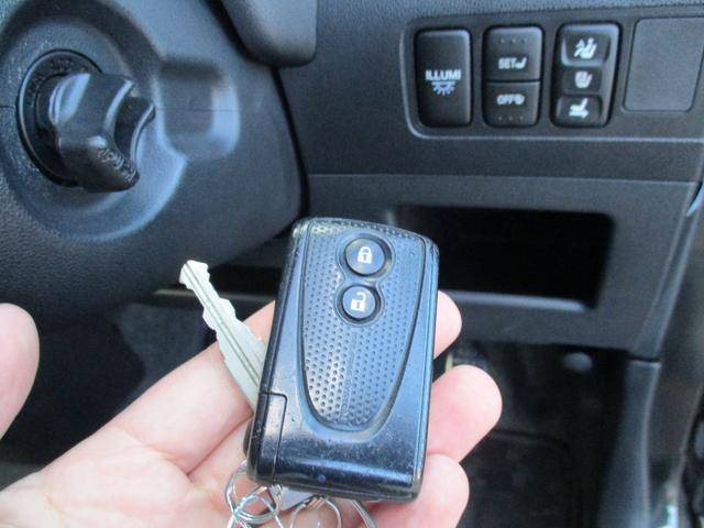 ムーヴコンテ カスタム　ＲＳ　ターボ　スマートキー　ＨＩＤ　純正１５インチアルミ　フォグライト　ウインカーミラー　ＭＯＭＯステアリング　オートエアコン　リアウィング（31枚目）