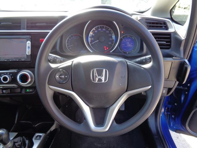 フィット １３Ｇ・Ｆパッケージ　５速マニュアル車　メモリーナビ　ＣＤ　ＤＶＤ　ＳＤ　地デジＴＶ　ブルートゥース　バックカメラ　ビルトインＥＴＣ　ドラレコ　ＬＥＤオートヘッドライト　ウィンカードアミラー　ドアバイザー　Ｐガラス（22枚目）