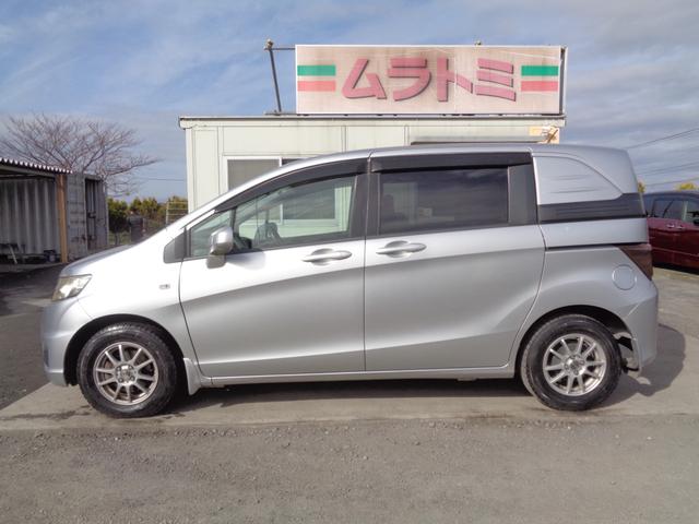 フリードスパイク G ジャストセレクション HDDナビ CD DVD MSV 地デジTV バックカメラ ビルトインETC HIDオートヘッドライト 社外14インチアルミ オートエアコン 両側スライドドア キーレスキー ドアバイザー 雹害(7枚目)