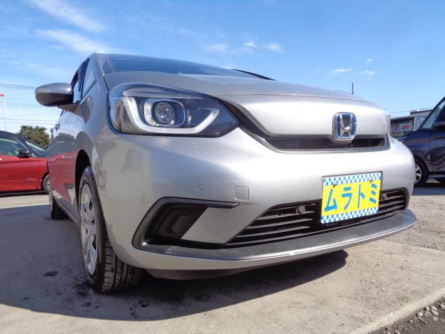 フィット ｅ：ＨＥＶベーシック　ホンダセンシング　メモリーナビ　ＣＤ　ＳＤ　ブルートゥース　バックカメラ　ビルトインＥＴＣ　ＬＥＤオートヘッドライト　パーキングサポート　前後クリアランスソナー　クルーズコントロール　オートエアコン（12枚目）