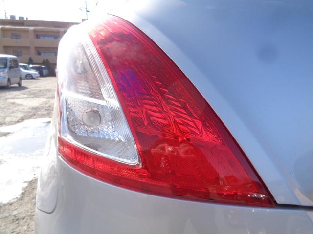 スイフト ＸＧ　５速マニュアル車　柿本改マフラー　社外１６インチアルミ　ＣＤデッキ　ビルトインＥＴＣ　プライバシーガラス　ドアバイザー　プッシュスタート　スマートキー　イモビ／セキュリティ　電格ミラー　オートエアコン（24枚目）