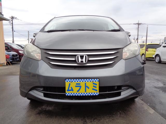 フリード Ｇ　Ｌパッケージ　ギャザズＡＵＸ対応ＣＤデッキ　ＥＴＣ２．０　左パワースライドドア　オートライト　ウィンカードアミラー　プライバシーガラス　ドアバイザー　ヘッドライトレベライザー　キーレスキー　８人乗（6枚目）