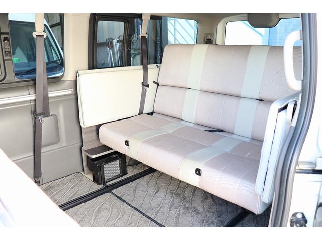 ＮＶ３５０キャラバンワゴン 　キャンピングカー／ＯＺ製グランドバケーション／２段ベッド／３列シート／社外ナビ／フリップダウンモニター／前後社外スタビライザー／パワースライドドア／リアクーラー／リアヒーター（13枚目）