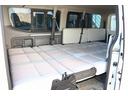 ＮＶ３５０キャラバンワゴン 　キャンピングカー／ＯＺ製グランドバケーション／２段ベッド／３列シート／社外ナビ／フリップダウンモニター／前後社外スタビライザー／パワースライドドア／リアクーラー／リアヒーター（4枚目）