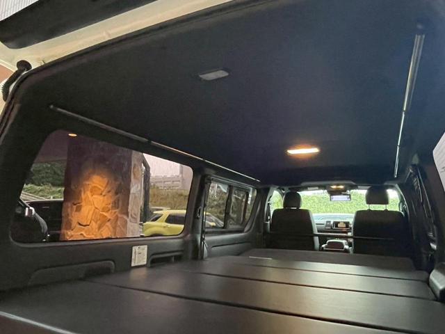 ハイエースバン スーパーＧＬ　ダークプライムＩＩ　Ｃａｒｉｃａ　Ｃａｌ‘ｓＭｏｔｏｒ　Ｃａｒｉｃａ　Ｃａｌ‘ｓＭｏｔｏｒ１１インチナビ　ＥＴＣ　デジタルミラー　バックカメラ　ベッドキット　ＲＡＹＳホイール　オープンカントリー（68枚目）