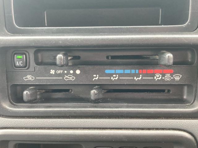 ハイゼットカーゴ ＤＸ　ドラレコ　ＥＴＣ　パワーウィンドウ　頭上コンソール　タイミングチェーン　ハイルーフ　インパネ４ＡＴ　修復歴無し　エアコン　パワステ　フルフラットシート　４ナンバー　軽貨物　積載量３５０ｋｇ（20枚目）