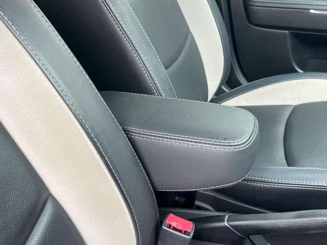 ベリーサ Ｌ　禁煙車　レザーシート　スマートキー　ビルトインＥＴＣ　オートライト　オートエアコン　Ｂｌｕｅｔｏｏｔｈ　ＣＤ　ＤＶＤ再生　地デジ（38枚目）