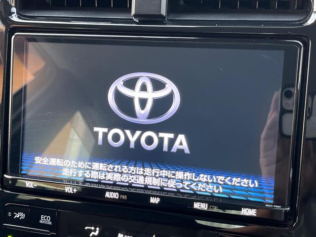プリウス A トヨタセーフティセンス 純正SDナビ 全周囲カメラ ETC Bluetooth フルセグ ドラレコ LEDヘッド LEDフォグ オートハイビーム 革巻きハンドル 純正15インチAW CD/DVD再生(3枚目)