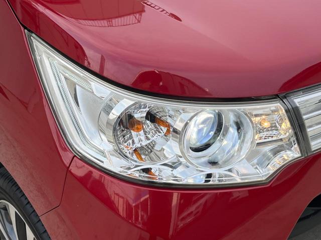 ワゴンＲスティングレー Ｔ　ＤＶＤナビ　バックカメラ　ＥＴＣ　Ｂｌｕｅｔｏｏｔｈ　フルセグ　スマートキー　ＨＩＤヘッド　革巻きハンドル　純正１５インチＡＷ　フォグライト　ＣＤ／ＤＶＤ再生　盗難防止装置　プライバシーガラス（12枚目）