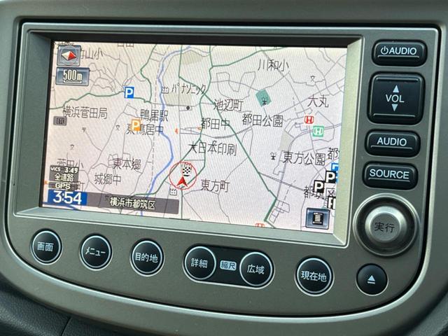 フィットハイブリッド ナビプレミアムセレクション 純正HDDナビ バックカメラ 禁煙車 スマートキー HIDヘッド ビルトインETC 純正15インチアルミ オートライト オートエアコン CD 地デジ パドルシフト(3枚目)