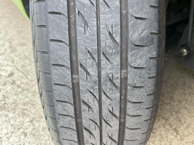 フィットハイブリッド ナビプレミアムセレクション 純正HDDナビ バックカメラ 禁煙車 スマートキー HIDヘッド ビルトインETC 純正15インチアルミ オートライト オートエアコン CD 地デジ パドルシフト(34枚目)