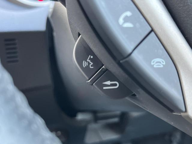 フィットハイブリッド ナビプレミアムセレクション 純正HDDナビ バックカメラ 禁煙車 スマートキー HIDヘッド ビルトインETC 純正15インチアルミ オートライト オートエアコン CD 地デジ パドルシフト(36枚目)