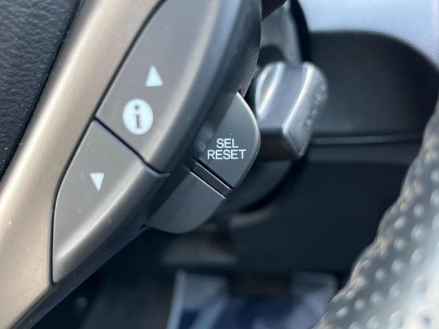 フィットハイブリッド ナビプレミアムセレクション 純正HDDナビ バックカメラ 禁煙車 スマートキー HIDヘッド ビルトインETC 純正15インチアルミ オートライト オートエアコン CD 地デジ パドルシフト(39枚目)