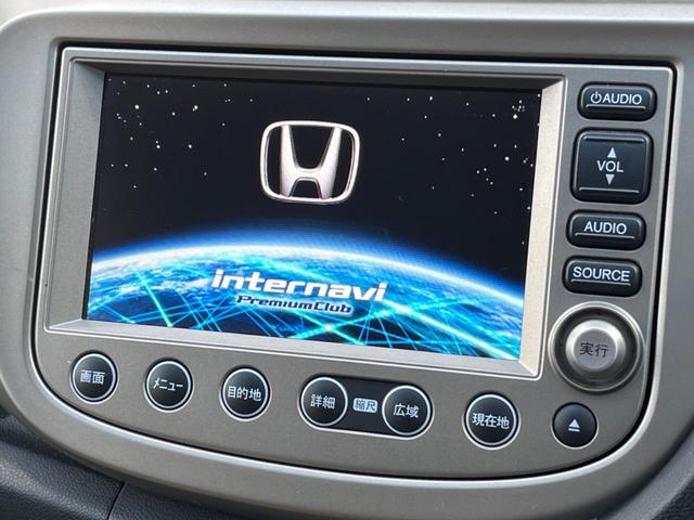 フィットハイブリッド ナビプレミアムセレクション 純正HDDナビ バックカメラ 禁煙車 スマートキー HIDヘッド ビルトインETC 純正15インチアルミ オートライト オートエアコン CD 地デジ パドルシフト(40枚目)
