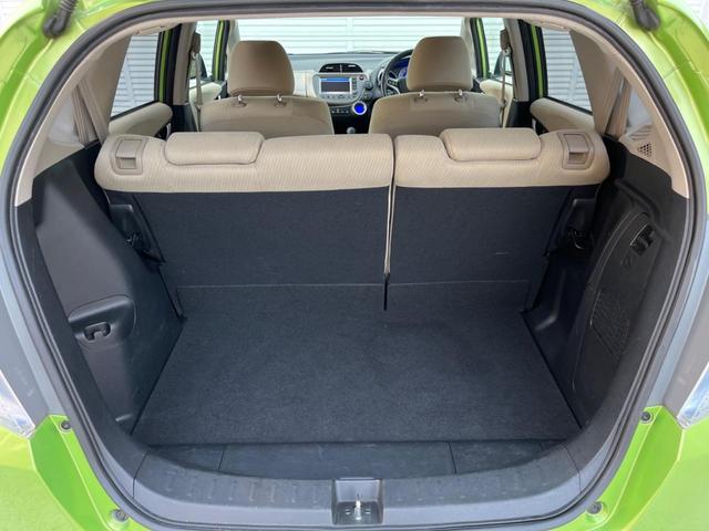 フィットハイブリッド ナビプレミアムセレクション 純正HDDナビ バックカメラ 禁煙車 スマートキー HIDヘッド ビルトインETC 純正15インチアルミ オートライト オートエアコン CD 地デジ パドルシフト(49枚目)