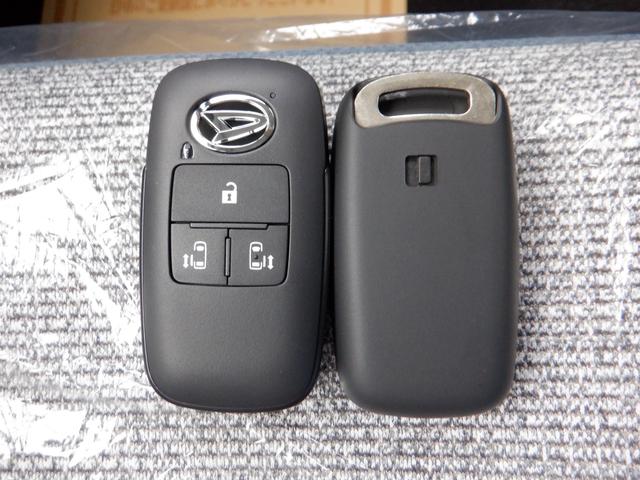 ムーヴキャンバス ストライプスＸ　ナビアップグレードパック　届出済未使用車　オートライト　バックカメラ　ＵＳＢ　ステアリングオーディオスイッチ　リアパーキングセンサー　オートエアコン　プッシュスタート　スマートキー　電動格納ミラー　左右電動スライドドア　禁煙車（28枚目）
