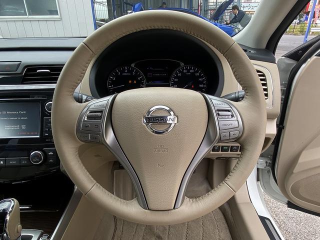 ティアナ ＸＶ　ナビＡＶＭパッケージ　フルセグナビ・全周囲カメラ・１７ＡＷ・ベージュ革シート・ベンチレーション・助手席オットマン・パワーシート・コーナーセンサー・クルーズコントロール・ＥＴＣ・ＨＩＤライト・エマージェンシーブレーキ・ＢＳＭ（9枚目）