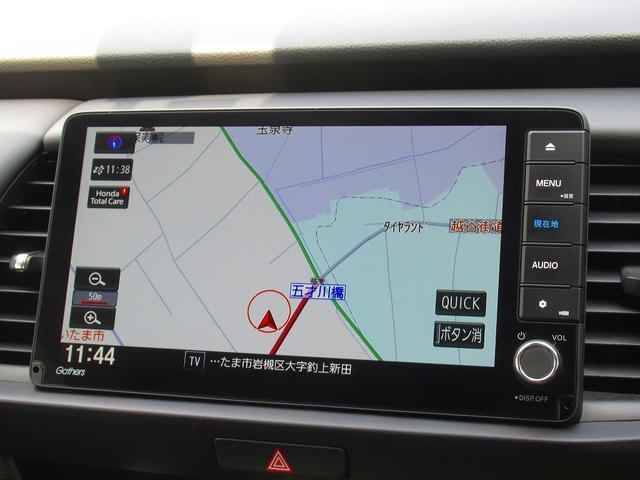 フィット ｅ：ＨＥＶホーム　ホンダセンシング・純正９インチナビ・バックカメラ・フルセグＴＶ・Ｂｌｕｅｔｏｏｔｈ・ＣＤ／ＤＶＤ再生・ＡＣＣ・ＬＫＡ・ＬＥＤヘッドライト・オートＨＩビーム・ハーフレザーシート・コーナーセンサー・ＥＴＣ（8枚目）