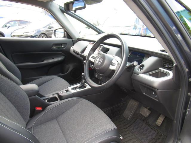 フィット ｅ：ＨＥＶホーム　ホンダセンシング・純正９インチナビ・バックカメラ・フルセグＴＶ・Ｂｌｕｅｔｏｏｔｈ・ＣＤ／ＤＶＤ再生・ＡＣＣ・ＬＫＡ・ＬＥＤヘッドライト・オートＨＩビーム・ハーフレザーシート・コーナーセンサー・ＥＴＣ（25枚目）