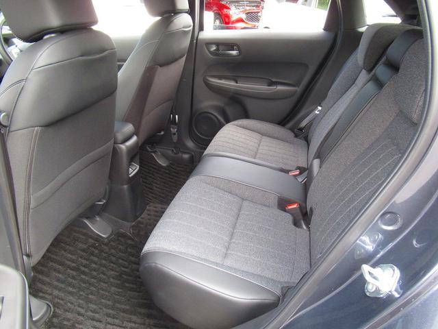 フィット ｅ：ＨＥＶホーム　ホンダセンシング・純正９インチナビ・バックカメラ・フルセグＴＶ・Ｂｌｕｅｔｏｏｔｈ・ＣＤ／ＤＶＤ再生・ＡＣＣ・ＬＫＡ・ＬＥＤヘッドライト・オートＨＩビーム・ハーフレザーシート・コーナーセンサー・ＥＴＣ（29枚目）