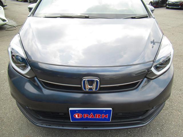 フィット ｅ：ＨＥＶホーム　ホンダセンシング・純正９インチナビ・バックカメラ・フルセグＴＶ・Ｂｌｕｅｔｏｏｔｈ・ＣＤ／ＤＶＤ再生・ＡＣＣ・ＬＫＡ・ＬＥＤヘッドライト・オートＨＩビーム・ハーフレザーシート・コーナーセンサー・ＥＴＣ（54枚目）