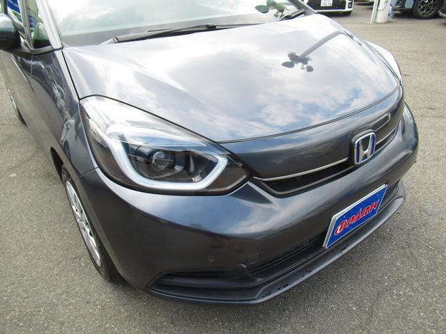 フィット ｅ：ＨＥＶホーム　ホンダセンシング・純正９インチナビ・バックカメラ・フルセグＴＶ・Ｂｌｕｅｔｏｏｔｈ・ＣＤ／ＤＶＤ再生・ＡＣＣ・ＬＫＡ・ＬＥＤヘッドライト・オートＨＩビーム・ハーフレザーシート・コーナーセンサー・ＥＴＣ（56枚目）