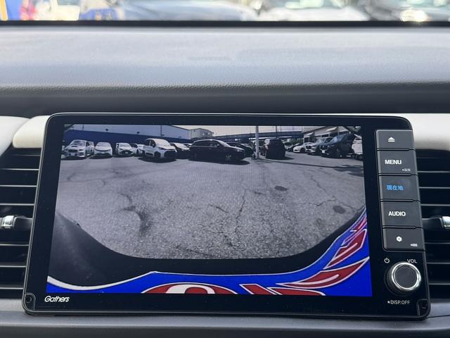 フィット ｅ：ＨＥＶホーム　ホンダセンシング・純正９インチナビ・バックカメラ・フルセグＴＶ・ＣＤ／ＤＶＤ再生・Ｂｌｕｅｔｏｏｔｈ・ＡＣＣ・ＬＫＡ・コーナーセンサー・ＬＥＤヘッドライト・オートＨＩビーム・ＥＴＣ・ハーフレザーシート（9枚目）