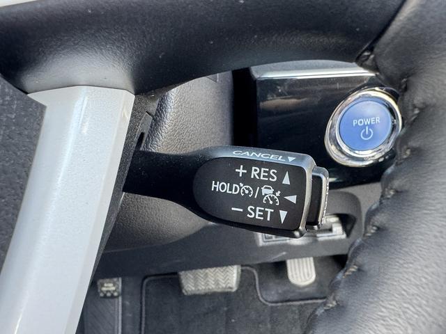 プリウス Ａ　セーフティセンス・純正９インチナビ・バックカメラ・フルセグＴＶ・Ｂｌｕｅｔｏｏｔｈ・ＣＤ／ＤＶＤ再生・ＡＣＣ・ＬＤＡ・ＢＳＭ・ＨＵＤ・パーキングアシスト・コーナーセンサー・オートＨＩビーム・ＥＴＣ（12枚目）