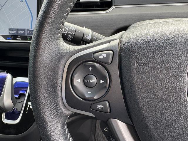 フリードハイブリッド ハイブリッド・EX 両Pスライド・Rモニター・フルセグ9inナビ・Bカメラ・BTオーディオ・LEDライト・ACC・LKA・シートヒーター・ドアバイザー・プライバシーガラス・本革ステア・ETC・15AW・オートライト(31枚目)