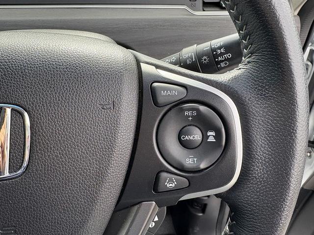 フリードハイブリッド ハイブリッド・EX 両Pスライド・Rモニター・フルセグ9inナビ・Bカメラ・BTオーディオ・LEDライト・ACC・LKA・シートヒーター・ドアバイザー・プライバシーガラス・本革ステア・ETC・15AW・オートライト(32枚目)