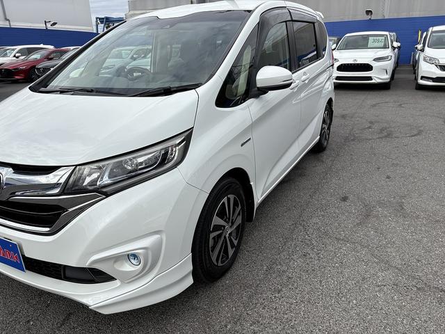 フリードハイブリッド ハイブリッド・EX 両Pスライド・Rモニター・フルセグ9inナビ・Bカメラ・BTオーディオ・LEDライト・ACC・LKA・シートヒーター・ドアバイザー・プライバシーガラス・本革ステア・ETC・15AW・オートライト(45枚目)