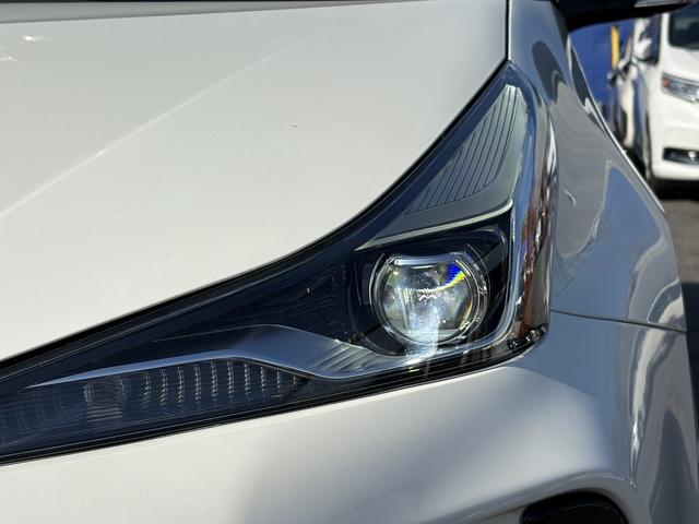 プリウス Ａツーリングセレクション　後期・９型純正フルセグナビ・全周囲カメラ・ＢＴオーディオ・ＥＴＣ２．０・ＤＶＤ再生・パワーシート・シートヒーター・パーキングアシスト・Ｃソナー・ＢＳＭ・ＨＵＤ・純正１７ＡＷ・ドアバイザー（31枚目）