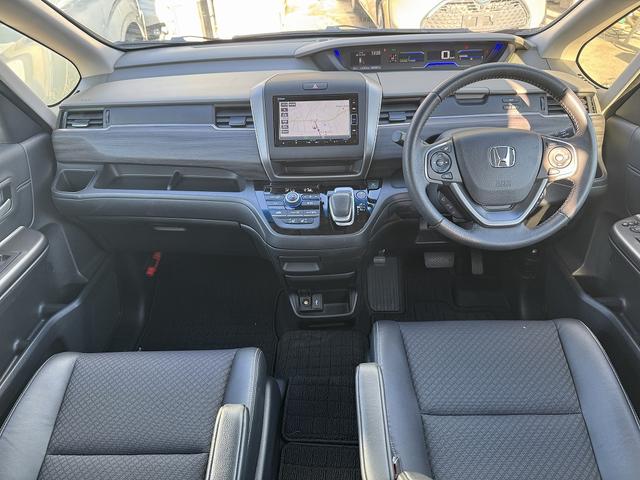 フリードハイブリッド ハイブリッド・Ｇ　両Ｐスライド・フルセグナビ・Ｂカメラ・ＢＴオーディオ・ＬＥＤライト・ハーフレザー・シートヒーター・ＡＣＣ・ＬＫＡ・ＥＴＣ・１５ＡＷ・プライバシーガラス・スマキー・本革ステア・ミラーウィンカー・記録簿（3枚目）